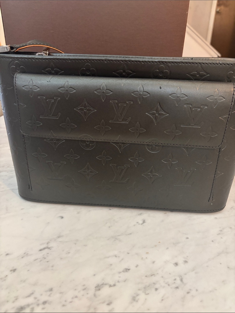 Louis Vuitton dark grey embossed Leather Bag with Tan Strap and accents.